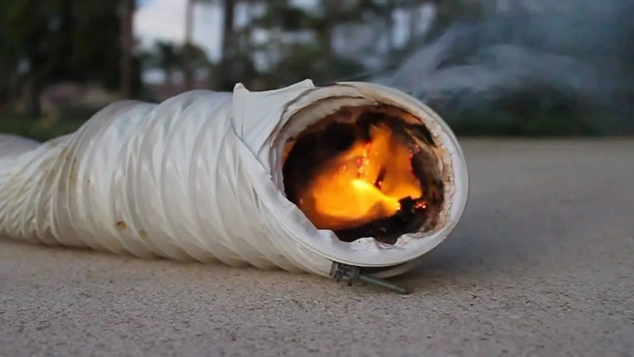 Lint burning inside a clogged dryer vent