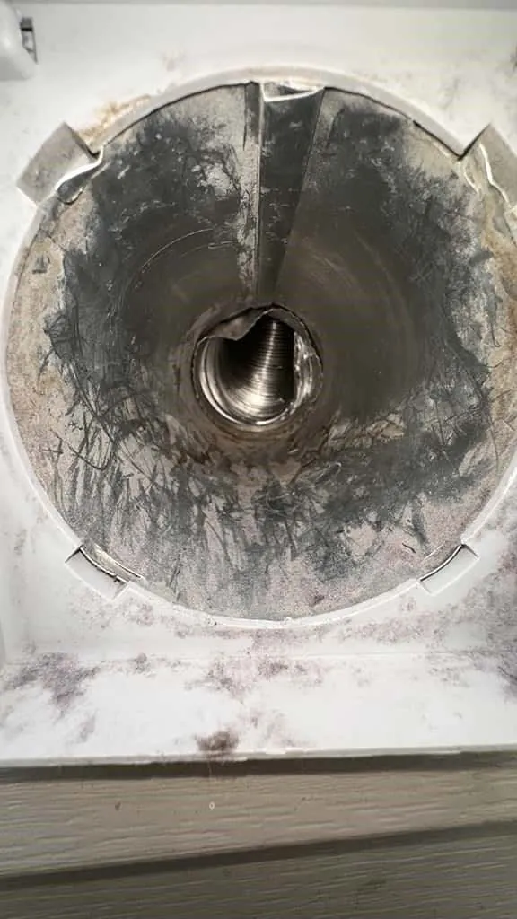 Round dryer vent after lint was removed