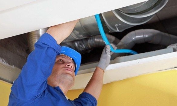 Air Duct Cleaning Professional check for dust in your furnace compartment.